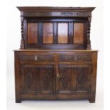 An 18th century and later panel back sideboard, the raised top with barley twist supports and carved