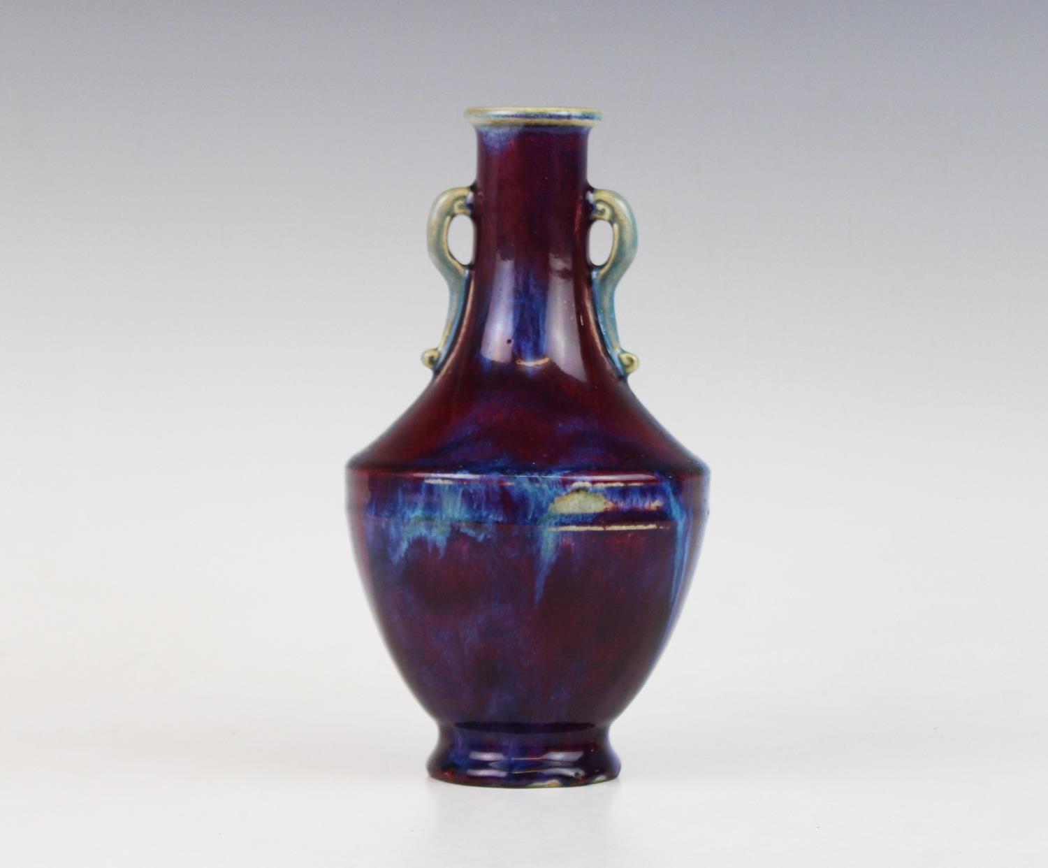 A Chinese porcelain flambe glazed vase bearing Qianlong seal mark, the vase glazed in high fired