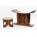 A West African Ashanti Ghana wooden stool, 30cm high, and a small East African Kamba Kenya child's