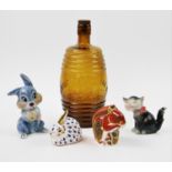 Two Royal Crown Derby figural paperweights, squirrel with gold stopper and a blue and white rabbit