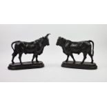 After C Valton, two bronzed spelter models of bulls, one with long horns, 25.5cm high, the other