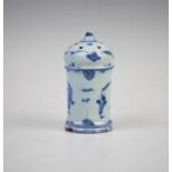 An 18th century Delft blue and white pounce pot, of cylindrical form, with pierced ogee top, the