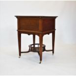An early 20th century metamorphic oak drinks table/ cabinet by Finnigans Ltd, Manchester, with a