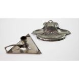 A WMF Art Nouveau pewter desk stand and inkwell, the relief-cast body with clover and berry