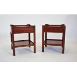 A pair of mahogany lamp/bedside tables, 20th century, each with a galleried top above a single
