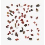 Assorted rough natural gem fragments, to include approx. 246 carats of sapphires,