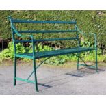 A 19th century painted iron strapwork garden bench, with scrolled terminals, reeded strapwork and