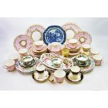 A 19th century continental tea service, the pink service with a white border embellished with