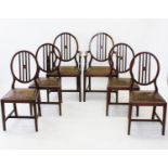 A set of ten early 20th century Art Deco mahogany dining chairs, each chair with an oval shaped back