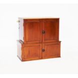 A Victorian mahogany wall cabinet, with two doors over two doors, applied with knob handles, 59cm