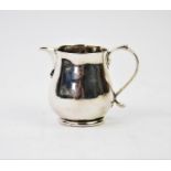 A George I silver cream jug, James Goodwin, London 1718, of plain polished form, with sparrow beak