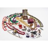 A collection of costume jewellery, to include, a selection of coloured bead necklaces, a