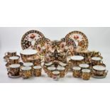 An extensive Royal Crown Derby Imari pattern tea service, the majority pattern number 2451, to