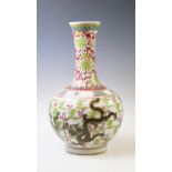 A Chinese porcelain bottle vase, kangxi mark, decorated in Wucai enamels depicting four imperial