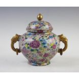 A Chinese porcelain millefiori vase and cover, Qianlong mark, of globular form with zoomorphic