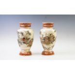 A pair of Japanese satsuma vases, Meiji period (1868-1912), the vases of baluster form decorated