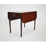 A 19th century mahogany Pembroke table, with a single frieze drawer, raised upon slender ring turned