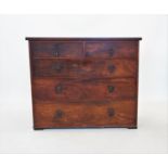 A 19th century mahogany chest of two short and three long drawers, applied with later droplet