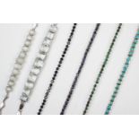 A collection of six stone set bracelets, comprising: an emerald set line bracelet, two sapphire