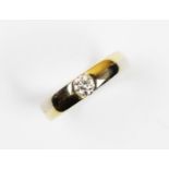 A diamond solitaire 18ct gold ring, the central brilliant cut diamond weighing approx. 0.30 carat,