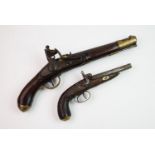 A 19th century and later double barrel percussion pistol, with a 19th century pattern flintlock