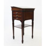 An Edwardian walnut clerks desk, with a hinged sloping green leather writing surface above a