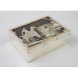 Hunting interest: An early 20th century white metal rectangular cigarette box, of plain polished