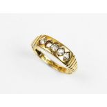 A diamond set 18ct yellow gold ring, the four old cut diamonds claw set to 18ct gold tapering