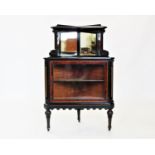 A late Victorian Aesthetic free standing corner cupboard, the ebonised and burr yew cabinet with