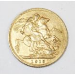 A George V gold sovereign dated 1915, gross weight 8.0gms
