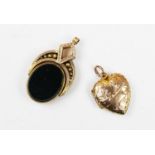A 9ct hardstone set swivel fob, the oval shaped fob set with bloodstone and carnelian, within a