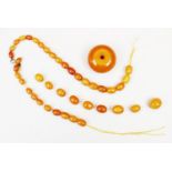 A Butterscotch amber necklace, the single strand necklace comprising forty-three graduated beads