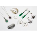 An assortment of silver and silver coloured jewellery to include a silver Celtic design heron