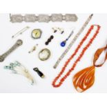 A selection of Victorian and vintage jewellery to include a jet pendant in the form of a fist set to