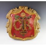 A George VI Coronation papier mache sign, designed as a red and gold shield decorated with Royal '