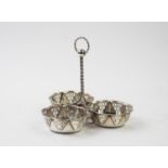 An Edwardian silver centrepiece, Synyer & Beddoes, Birmingham 1913, designed as three pierced