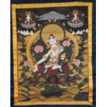 Three Tibetan Thangka's, each painted in polychrome colours and within silk mounts, largest 57cm x