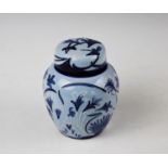 A Moorcroft ginger jar and cover decorated in the ?Midnight Summer? design by Philip Gibson 2002 (