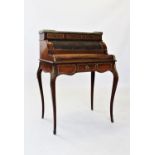 A French rosewood bureau de dame, late 19th century, having a rouge marble top within an openwork