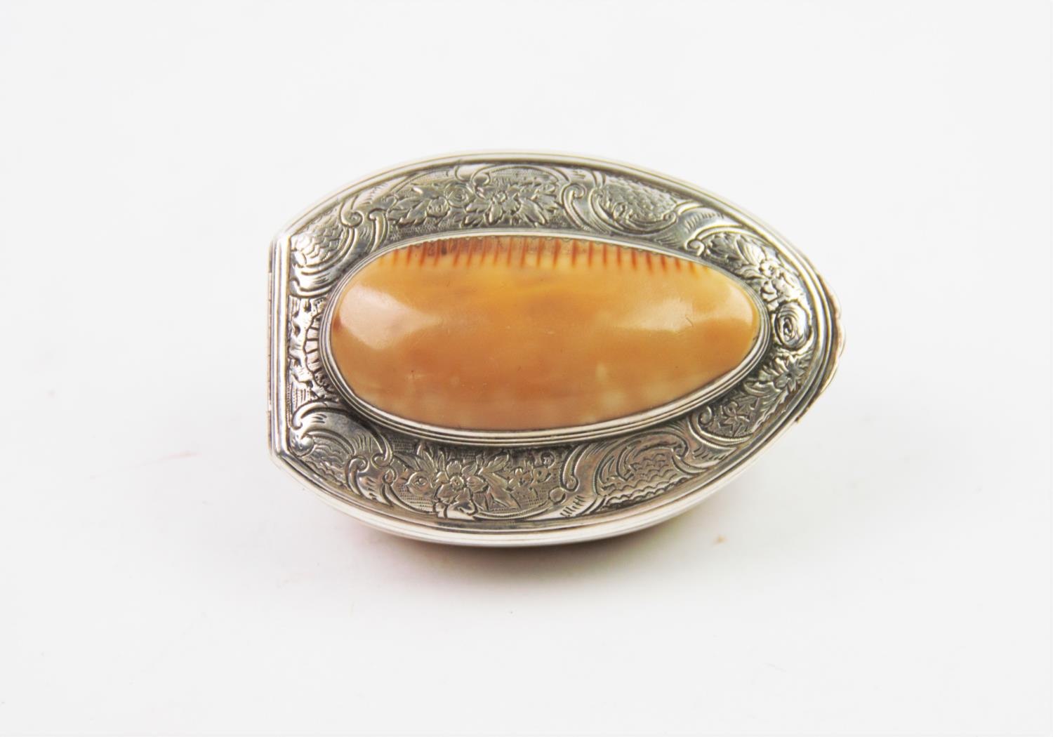 A 20th century white metal mounted shell snuff box, the shell designed with white metal collar,
