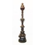 A large Japanese bronze floor lamp, Meiji period (1868-1912), the tall standard lamp raised on a