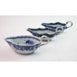 A pair of Chinese blue and white sauce boats, circa 1770, painted with prunus and cell-diaper