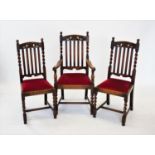 A set of six 1930's oak dining chairs, each with a lath back and barley twist supports, to include