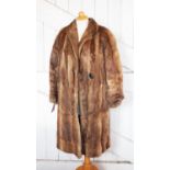 A George Henry Lee ladies mink three quarter length coat and a ladies three quarter length cony