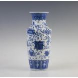 A Chinese porcelain blue and white Daoist emblems vase, Kangxi mark, of high shouldered form