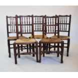A matched set of five early 19th century ash and elm spindle back country chairs, each with two rows