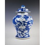 A large Chinese blue and white prunus pattern temple jar and cover, 19th century, of typical
