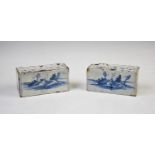 A pair of early 18th century Delft blue and white flower bricks, each of rectangular form with