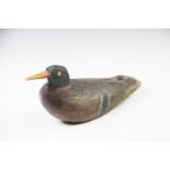 An early 20th century painted wooden duck decoy, 40cm long