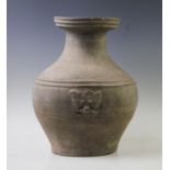 A large Chinese Han Dynasty style terracotta vase, of baluster form and externally decorated with